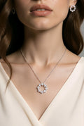 Model wearing the Laurel Wreath CZ necklace and earrings in silver-tone finish