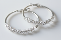 Cubic zirconia cluster hoop earrings angle view
