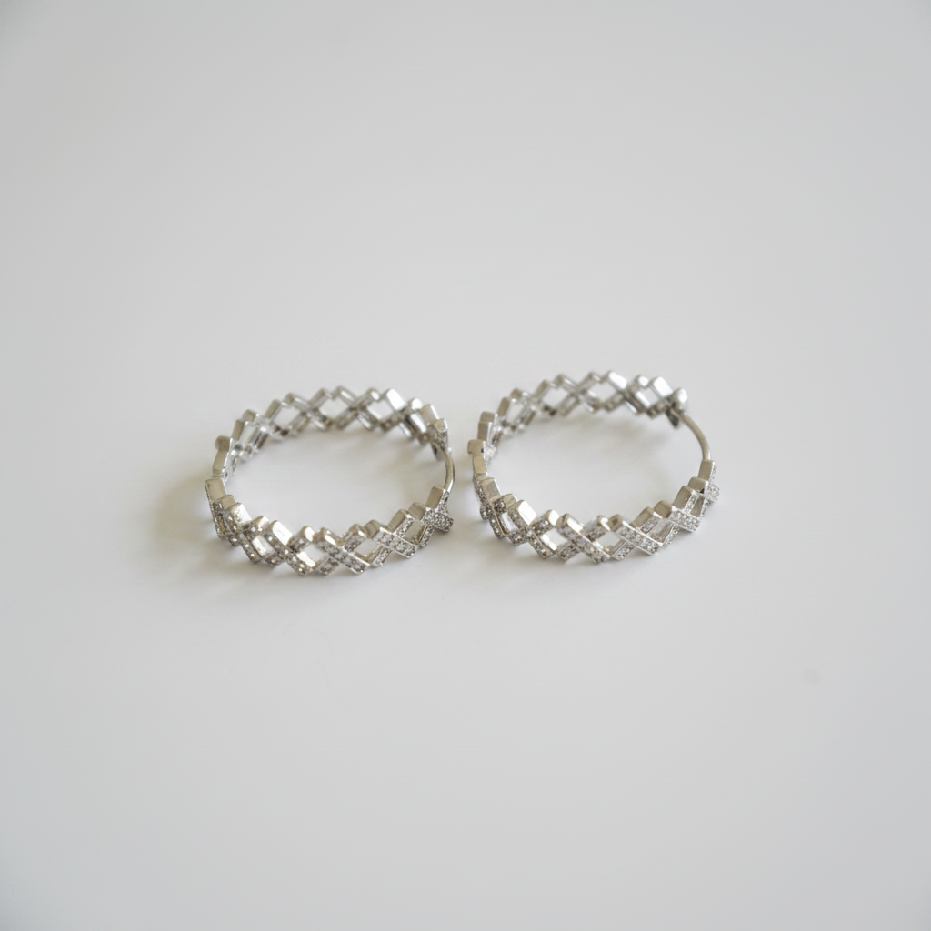 Cubic zirconia lattice hoop earrings front view on white background